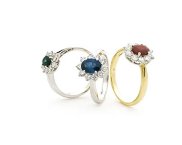 Oval Cut Centre Emerald & Diamond Ring