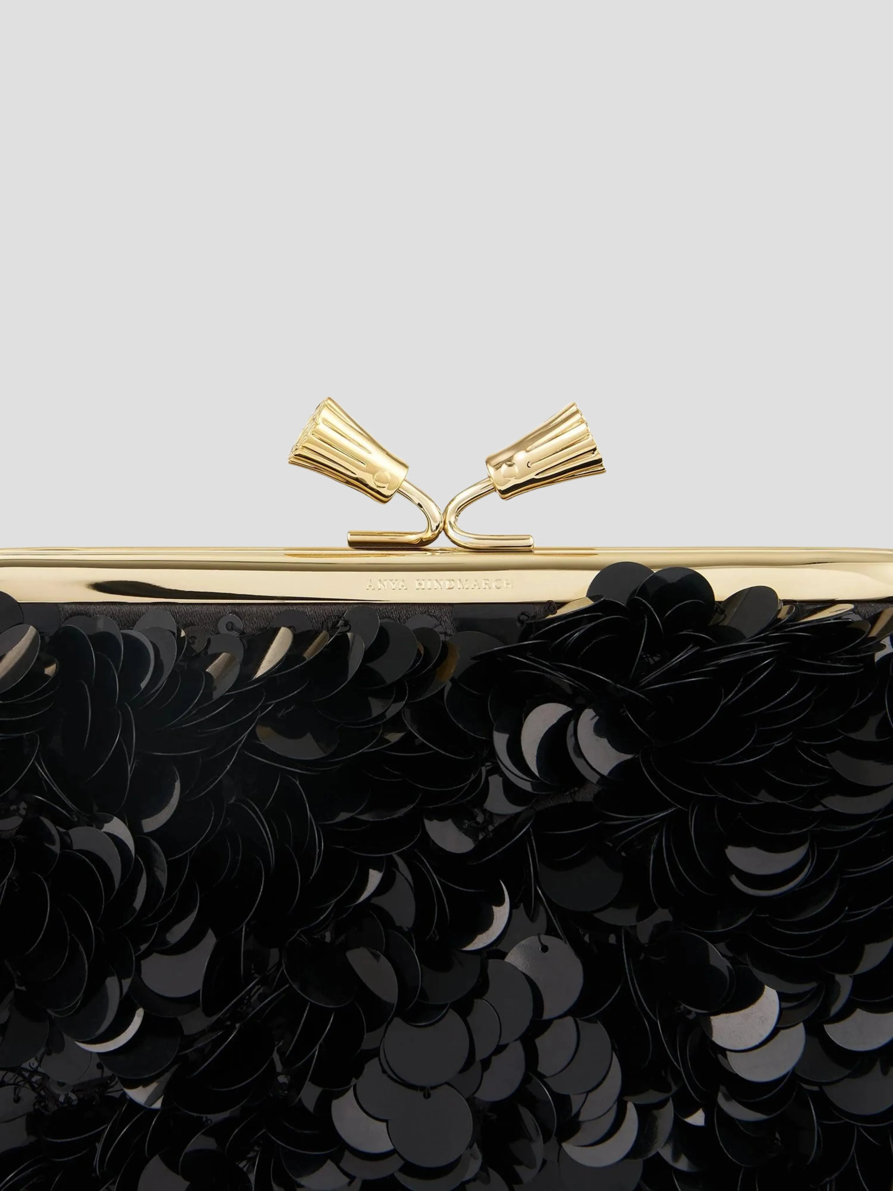 Sequined Maud Tassel Clutch in Black